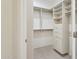 Walk-in closet providing ample shelving and drawer space for storage at 20660 N 40Th St # 1089, Phoenix, AZ 85050