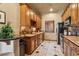Well-equipped kitchen with granite countertops, tile backsplash, and stainless steel appliances at 20660 N 40Th St # 1089, Phoenix, AZ 85050
