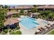 Beautiful community pool area with cabanas and lounge chairs for relaxation at 20660 N 40Th St # 1089, Phoenix, AZ 85050