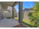 Relaxing covered back patio, with artificial grass, desert landscaping, and block fence privacy wall at 2402 E 5Th St # 1621, Tempe, AZ 85288