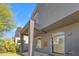 Cozy covered backyard patio, with sliding glass doors leading into the home, with easy access to desert landscaping at 2402 E 5Th St # 1621, Tempe, AZ 85288
