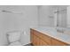 Bathroom featuring a toilet, a single sink vanity, and an open shower area at 2402 E 5Th St # 1621, Tempe, AZ 85288