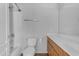 Bright bathroom featuring a shower-tub combo, toilet, and a vanity with a white countertop at 2402 E 5Th St # 1621, Tempe, AZ 85288
