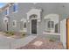 Inviting townhome exterior with a covered entryway and desert-friendly landscaping at 2402 E 5Th St # 1621, Tempe, AZ 85288