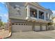 Townhome featuring a private balcony, three-car garage, and contemporary design at 2402 E 5Th St # 1621, Tempe, AZ 85288