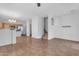 Expansive living space features tile flooring, and an adjacent kitchen area at 2402 E 5Th St # 1621, Tempe, AZ 85288