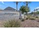 Elegant community entrance sign with stone accents and lush landscaping at 2402 E 5Th St # 1621, Tempe, AZ 85288