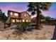 Outdoor area features an inviting pool, lush palm trees, and ample lounge seating at 3437 E Kingbird Pl, Chandler, AZ 85286