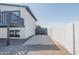 Side yard driveway features a painted brick wall and access to a balcony at 4530 W Paradise Dr, Glendale, AZ 85304