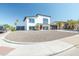 Contemporary two-story home with a front yard of decorative gravel at 4530 W Paradise Dr, Glendale, AZ 85304
