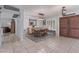 Traditional dining room featuring tile floors, wood furniture, and lots of natural light at 5008 E Nisbet Rd, Scottsdale, AZ 85254