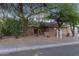 Charming single-story home with desert landscaping and a cozy front entrance at 5008 E Nisbet Rd, Scottsdale, AZ 85254