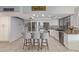 Bright kitchen featuring an island with seating, stainless steel appliances, and modern finishes at 5008 E Nisbet Rd, Scottsdale, AZ 85254