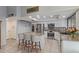 Modern kitchen with stainless steel appliances, a kitchen island, and ample cabinet space at 5008 E Nisbet Rd, Scottsdale, AZ 85254