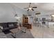 Open concept living room with views into the kitchen featuring a kitchen island at 5008 E Nisbet Rd, Scottsdale, AZ 85254