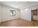 Bright bedroom featuring recessed lighting, hardwood flooring, and a closet at 6202 E Larkspur Dr, Scottsdale, AZ 85254