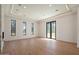 Bright and airy living room with hardwood floors, recessed lighting, and multiple windows at 6202 E Larkspur Dr, Scottsdale, AZ 85254