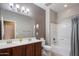 Bathroom with double vanity, walk-in shower and soaking tub at 865 E Rojo Ct, Gilbert, AZ 85297