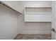 Walk-in closet with built-in shelving for efficient storage at 865 E Rojo Ct, Gilbert, AZ 85297