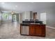 Open kitchen with island and stainless steel appliances at 865 E Rojo Ct, Gilbert, AZ 85297