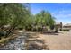 Community park featuring mature shade trees and walking paths, a great neighborhood amenity at 865 E Rojo Ct, Gilbert, AZ 85297