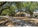 Tree lined street with sidewalks, creating a beautiful setting at 865 E Rojo Ct, Gilbert, AZ 85297