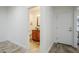 A half bathroom features custom cabinetry, granite countertops, and updated vanity at 1001 N Quail Ln, Gilbert, AZ 85233