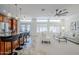Open concept living and dining room with modern finishes and natural light at 1001 N Quail Ln, Gilbert, AZ 85233