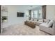 Relaxing bedroom with a comfortable sectional sofa and neutral decor at 10149 E Ursula Ave, Mesa, AZ 85212