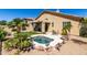 Landscaped backyard with small pool and outdoor seating area at 10287 E Verbena Ln, Scottsdale, AZ 85255