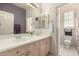 Bathroom with dual sinks and a separate water closet at 10287 E Verbena Ln, Scottsdale, AZ 85255