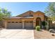 Charming single-story home with a three-car garage and well-maintained desert landscaping at 10287 E Verbena Ln, Scottsdale, AZ 85255