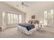 Serene main bedroom featuring large windows with shutters and neutral décor at 10287 E Verbena Ln, Scottsdale, AZ 85255