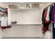 Functional walk-in closet with ample shelving and hanging space for storage at 10287 E Verbena Ln, Scottsdale, AZ 85255