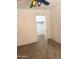 Neutral bedroom features carpeted floors, a ceiling fan and a walk in closet at 10528 W Jessie Ln, Peoria, AZ 85383