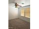 Cozy bedroom with neutral carpet and natural lighting at 10528 W Jessie Ln, Peoria, AZ 85383