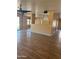 The living room features wood floors and a view of the kitchen at 10528 W Jessie Ln, Peoria, AZ 85383