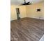 The living room features wood floors and a ceiling fan at 10528 W Jessie Ln, Peoria, AZ 85383