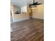 The living room features wood floors and a ceiling fan at 10528 W Jessie Ln, Peoria, AZ 85383