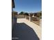 Second story patio with metal railings overlooking neighborhood homes and blue sky at 10528 W Jessie Ln, Peoria, AZ 85383