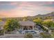 Stunning home with a luxurious pool, spa, and mountain views, perfect for outdoor living and entertaining at its finest at 10811 E Acoma Dr, Scottsdale, AZ 85255