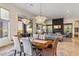 Open floor plan featuring a dining room, living room, and desert views at 10811 E Acoma Dr, Scottsdale, AZ 85255