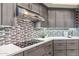 Contemporary kitchen featuring sleek countertops and modern appliances at 10811 E Acoma Dr, Scottsdale, AZ 85255