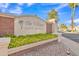 Entrance to the community featuring lush landscaping and professional signage for The Villages at 1120 N Val Vista Dr # 10, Gilbert, AZ 85234