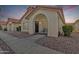 Charming single-story home featuring a welcoming archway entrance and well-kept landscaping at 1120 N Val Vista Dr # 10, Gilbert, AZ 85234