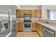 Fully equipped kitchen with stainless steel appliances and plenty of storage at 1120 N Val Vista Dr # 10, Gilbert, AZ 85234