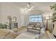 Inviting living room with a comfortable sofa, stylish decor, and bright lighting at 1120 N Val Vista Dr # 10, Gilbert, AZ 85234