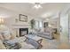Inviting living room with a fireplace, neutral tones, and comfortable seating at 1120 N Val Vista Dr # 10, Gilbert, AZ 85234