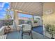 Inviting outdoor patio with a round table, chairs, and views of the landscaped backyard at 1120 N Val Vista Dr # 10, Gilbert, AZ 85234