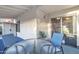 Outdoor patio featuring a dining set, access to the indoors, and pleasant backyard views at 1120 N Val Vista Dr # 10, Gilbert, AZ 85234